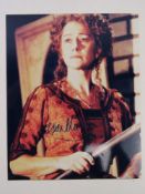 A hand signed photograph of Dame Helen Mirren DBE, autograph in blue pen.