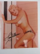 A hand signed glamour photograph of June Wilkinson, autograph in black pen.