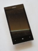 A Nokia 525 Windows phone in white. D