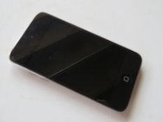 An Apple iPod Touch 32GB EMC240. Disc