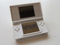A Nintendo DS Lite in white, no stylus,
