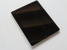 An Applie iPad 32GB model A1430 black 9.