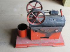 A Mamod type live steam engine casing inc two flywheels, no engine. Base measuring approx.