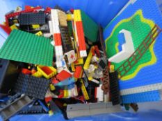 A large quantity of assorted Lego inc mini figures, boards, etc, in lidded storage box,
