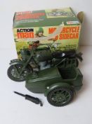 A vintage Action Man motorcycle and sidecar toy by Palitoy in original box, slightly a/f.