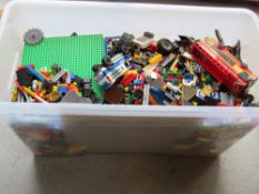 A vast collection of Lego within plastic tub inc sightseeing bus, police, riot vehicle, boards,