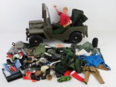 Vintage Action Man; jointed doll with army jeep and a quantity of assorted clothing and accessories.