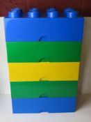 A set of five Lego 'brick' stacking boxes with assorted contents inc mini figures, lifeboat, etc.
