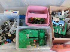 A large quantity of assorted Lego inc mini figures, pink storage box, vehicle, etc,