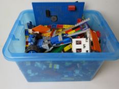 A quantity of assorted Lego in storage box, total weight 5.8kg.