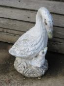 A garden statue in the form of a swan and cignet, 56cm high, repair noted to beak.
