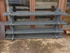 A wooden plant stand, measuring approx 180cm wide.