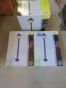A set of three garden lights 'as new' in boxes.
