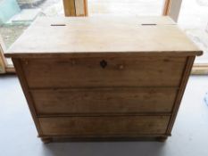 A stripped pine blanket box having single drawer under measuring approx 106 x 62 x 82cm.