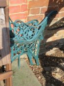 A pair of metal bench ends.