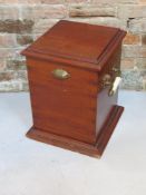 A fireside coal box having twin end handles, measuring approx 36cm wide.