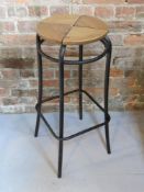 A contemporary bar stool.