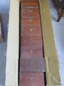 Eight Vickers training aid sets in boxes