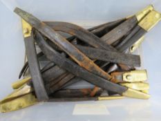 A quantity of sword scabbards, some havi