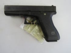 A deactivated Glock 17 9mm second genera