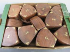 Twenty contemporary wooden and brass Nav