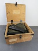 A wooden transit box containing M16 stoc