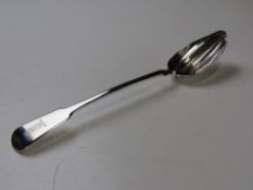 To match above lot; A HM silver slotted spoon, hallmarked London 1824 and bearing maker's mark 'JH'.