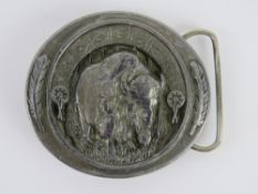 A Buckles of American Native American themed belt buckle having buffalo to centre,