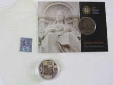 A Royal Mint Queen Victorian Old Head Penny in packaging,
