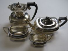 A HM silver tea set comprising teapot, hot water jug, milk and sugar bowl. Total weight 1784g.