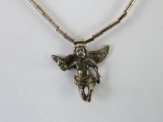 A cherub pendant on Native American style silver beaded chain with two white pearls upon,