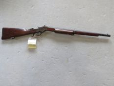 A deactivated J. Stevens Rolling Block .