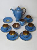 A Crown Devon Fieldings turquoise and copper coloured coffee service comprising five cups and