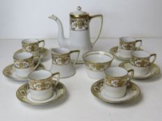 A Noritake coffee service comprising six coffee cans and saucers, coffee pot,