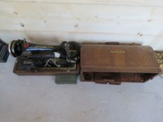 A vintage Singer sewing machine having cable accessories, lid, key, etc, serial no Y8004507.