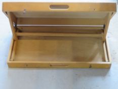 A pop-up fold over table measuring approx 60cm wide.