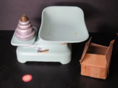 A green painted Weylux 'The Princess' set of weighing scales together with silver painted weights.