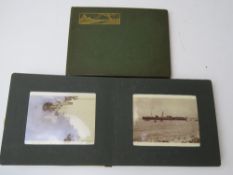 A pair of early 20thC photograph albums featuring seaside scenes, motorbikes inc side car, portrait,