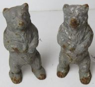 A pair of cast iron bear figurines for use as door stops, each approx 16cm high.