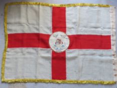 An antique English flag having hand woven tapestry to centre with initial 'M' and 1916 - 1919 India