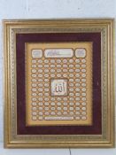 An Arabic montage, framed and glazed, sight size 32 x 40cm, framed size 56.5 x 65cm.