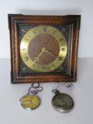 A Smiths Sectric movement and chapter ring mounted in glazed wooden frame,