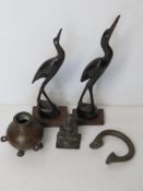 A pair of carved Oriental stork figurines approx 17.