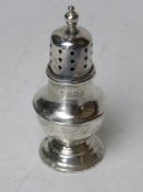 A HM silver pepperette bearing maker's mark for Adie Brothers Ltd and hallmarked Birmingham 1922,