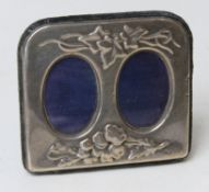 A small sized HM silver photograph frame having ivy and floral decoration upon, 8.