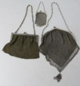 Three chain link evening bags.