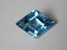A loose blue topaz gemstone approx 15 x 11 x 6.3mm.