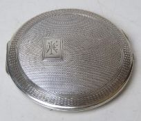 A HM silver Mappin & Webb compact hallmarked Birmingham 1935 having mirror and brass powder holder