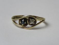 A handmade 9ct gold sapphire and diamond ring, hallmarked 375, size J, 1.2g.