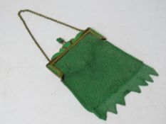 An Art Deco jade green coloured chain evening bag.